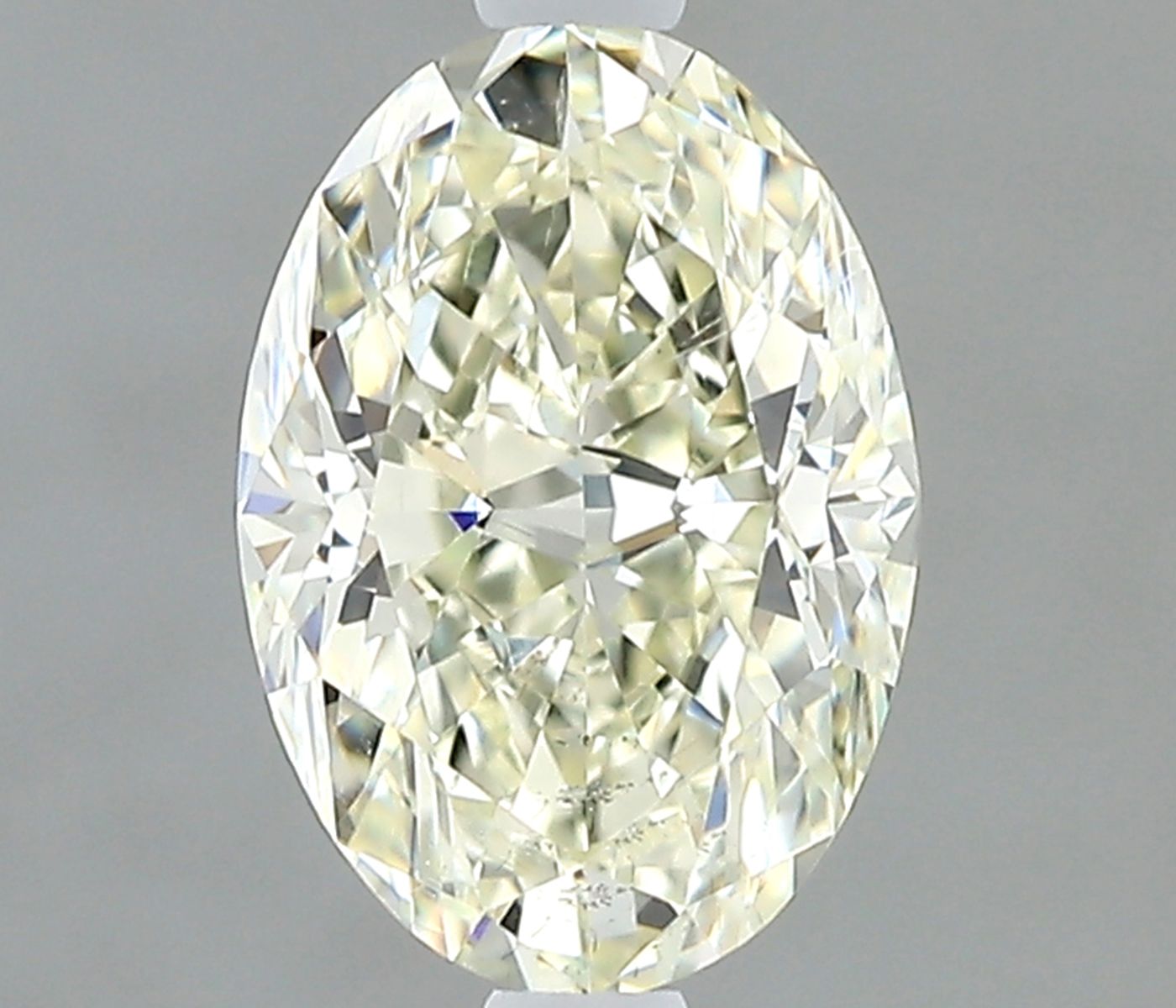 Diamond Natural 0,73Ct K-SI1 Oval - IGI734508559